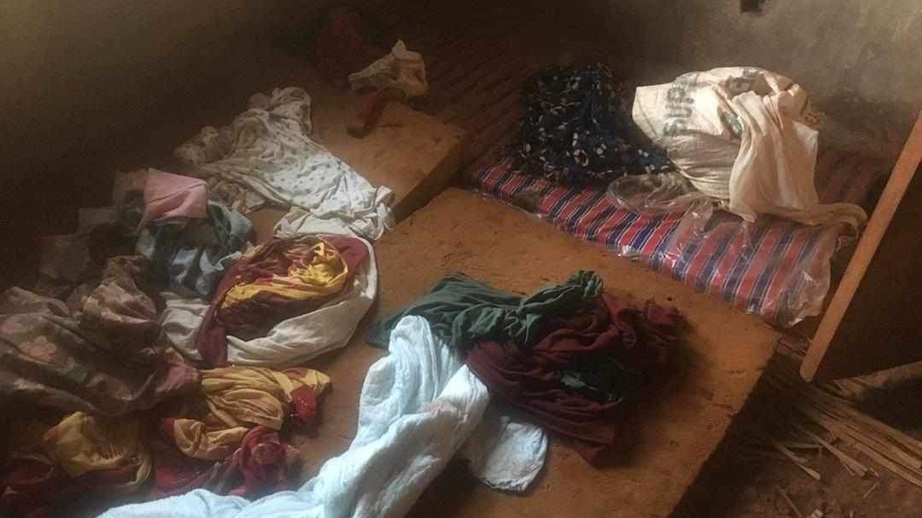 Where the children slept in 2024: mats and clothes on a bare floor