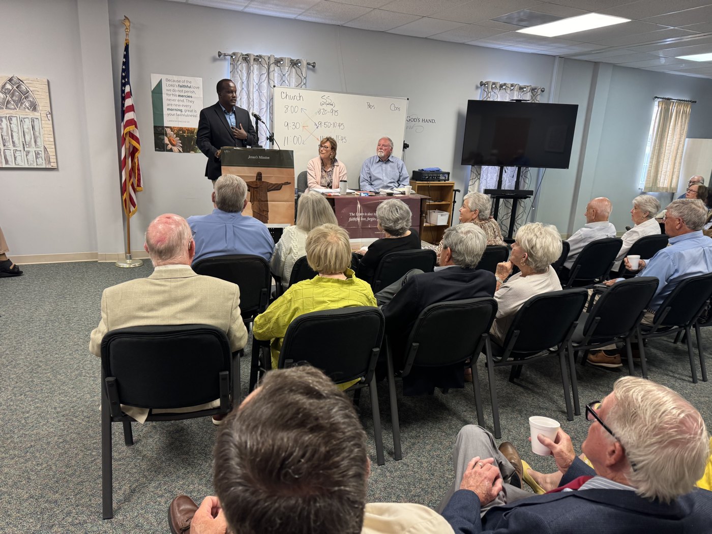 Enock Nkulanga speaking to the Empty Nesters class