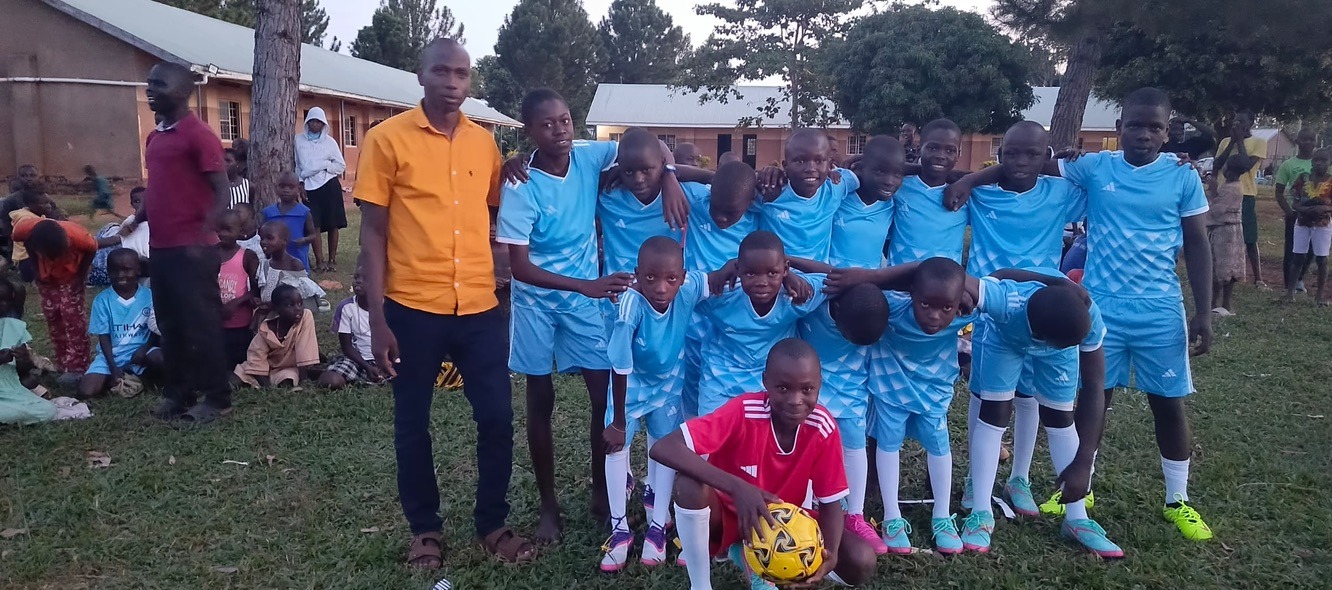 The boys’ soccer team in blue uniforms