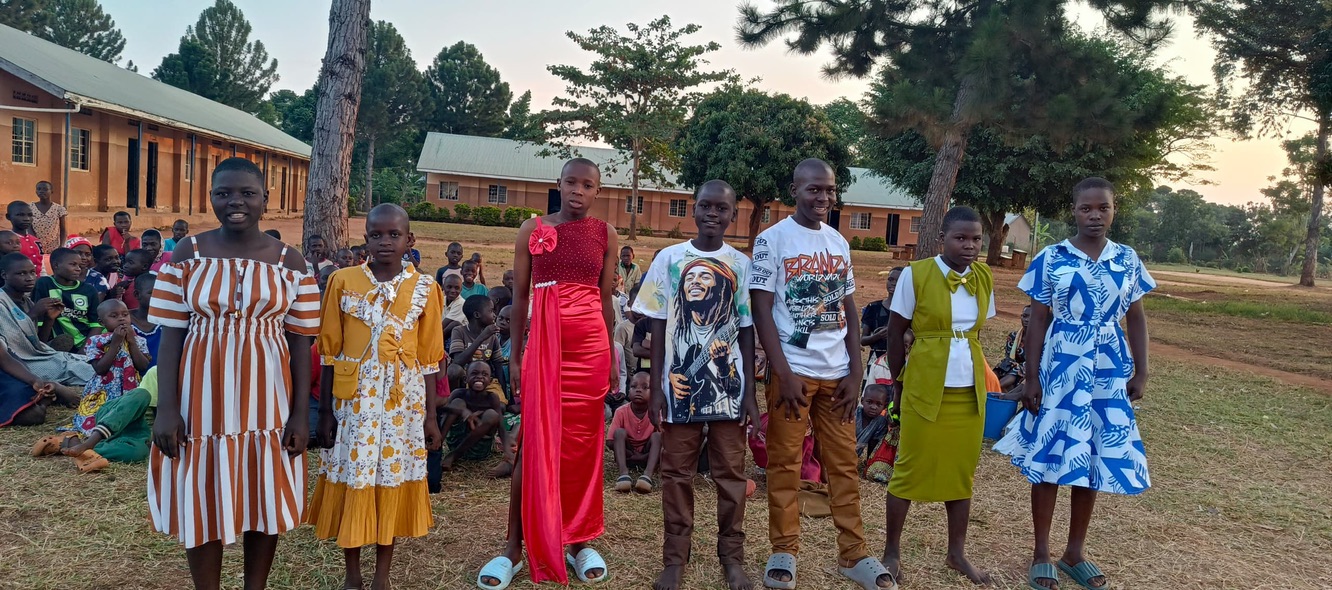 The July birthday children in their new clothes